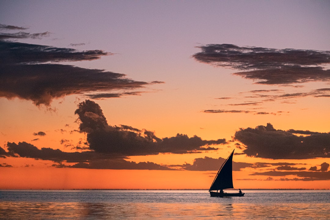 Sailboat on the water at sunset in Bazaruto Archipelago National Park