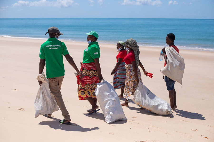 People walking along the beach in Bazaruto Archipelago National Park