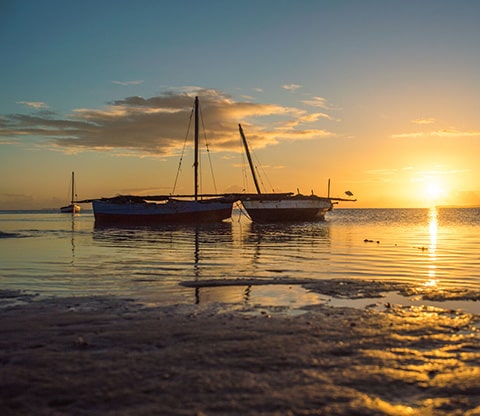 Two boats moored in the waters of Bazaruto Archipelago National Park